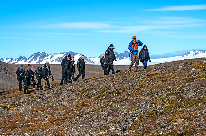 Discovery team members leading a hike in Longyearbyen