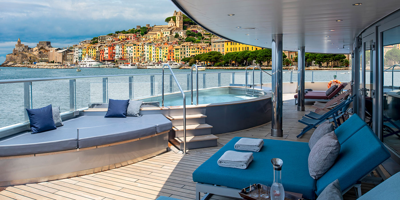 Scenic Eclipse Spa Deck with Portovenere, Italy, in the background
