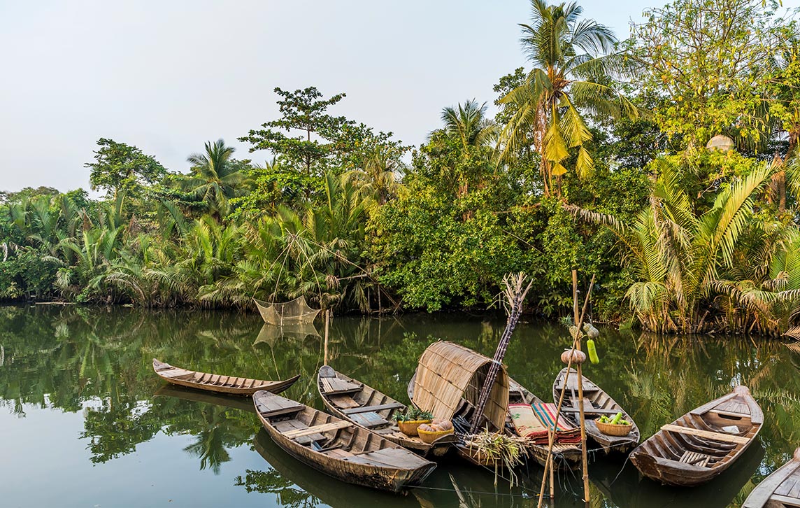 local boats floating on the river, Mekong Delta, Vietnam