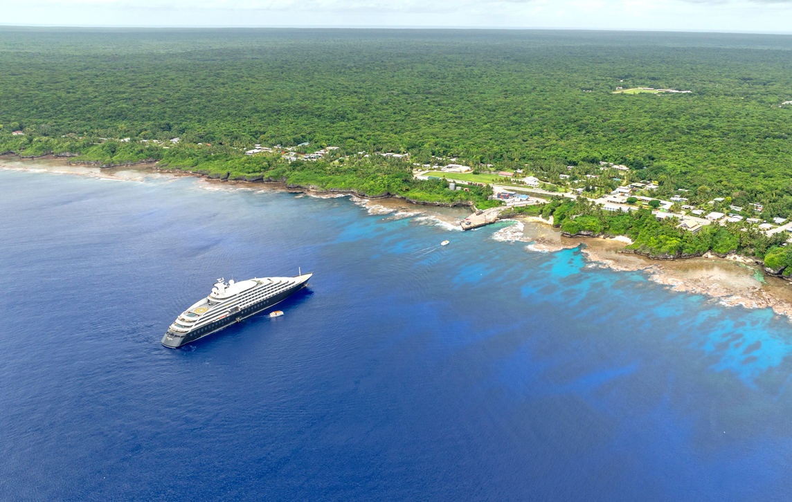 Aerial shot of super yacht at Niue, Polynesia