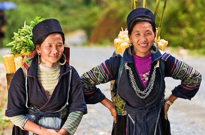 Women carrying corn in Sapa, Vietnam