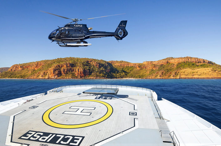 Helicopter landing on Scenic Eclipse cruise ship