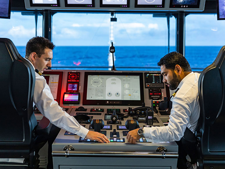 Ship Captains sitting at the controls 