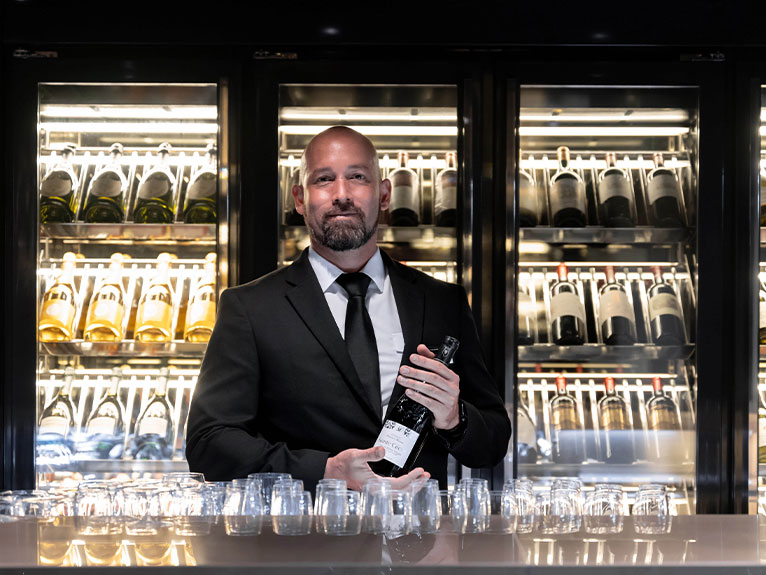 Man in a suite with champagne 