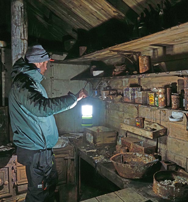 Scenic Eclipse guests inside Mawsons Huts, Cape Denison, East Antarctica